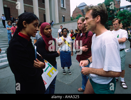 Students discussing politics on the campus of Harvard University, Cambridge, Massachusetts Stock Photo