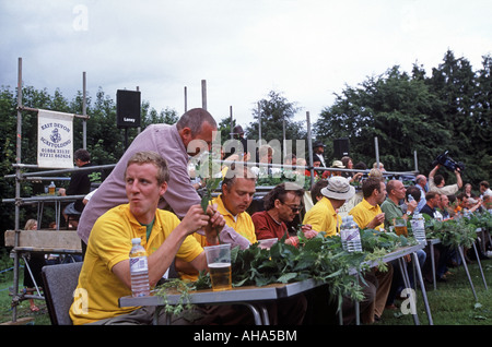 World nettle eating championships at the Bottle Inn Marshwood Vale Dorset England Stock Photo