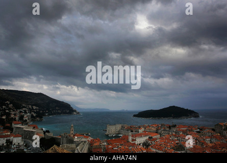 Dark clouds gather over the city of Dubrovnik and island of Lokrum on the Mediterranean coast of Croatia Stock Photo