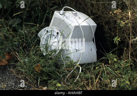Computer monitor abandoned roadside, UK Stock Photo