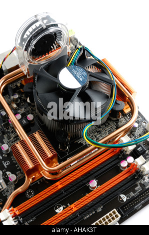 CPU cooler fan with radiator on a high end computer motherboard Stock Photo