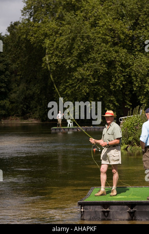 UK Hampshire Romsey Broadlands CLA Game Fair Fly fishing tuition on River Test Stock Photo