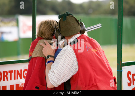 UK Hampshire Romsey Broadlands CLA Game Fair William Miles being taught how to shoot Stock Photo