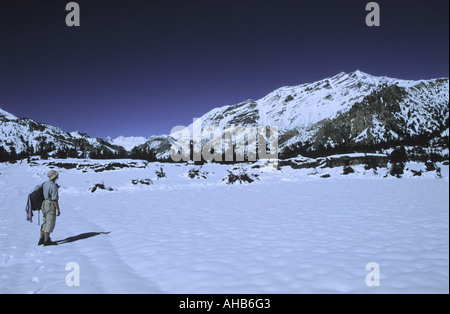 Vast fields of fresh snow and mountains of Lower Pisang in Annapurna Conservation area Nepal Stock Photo