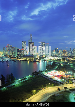 Singapore skyline with urban buildings over water Stock Photo - Alamy