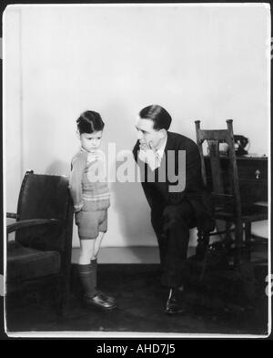 Father Sulky Boy Stock Photo