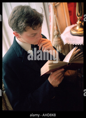 Young Man Reading Stock Photo