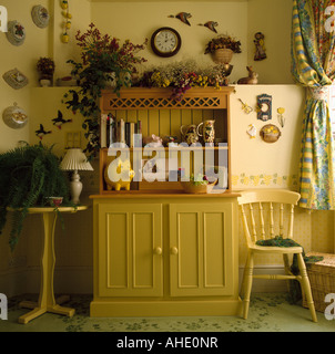 Yellow Kitchen With Painted Dresser Stock Photo 9969376 Alamy
