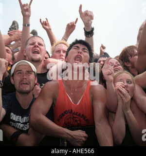 American punk rock fans in the mosh pit of an outdoor punk festival, the Warped Tour, Virginia, USA. Stock Photo