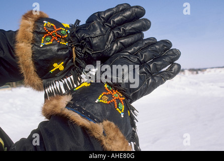 Hand made and decorated caribou skin gloves Note hand stitching along back of hands Labrador Newfoundland Canada Stock Photo