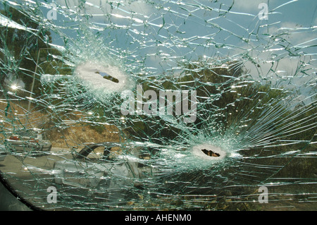 A windshield of a car shows shrapnel damage from a rocket fired by Hezbollah Katyusha rocket in northern Israel Stock Photo