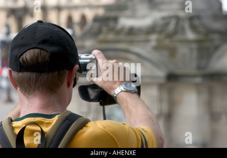 tourist man taking a picture using a digital camera paris france Stock Photo