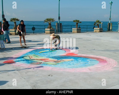 Julian Beever sidewalk chalk artist creates drawing on Redondo Beach Pier CA. USA Stock Photo