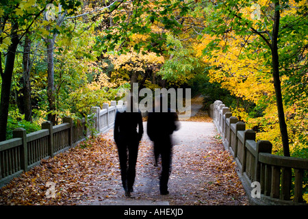Couple enjoying Fall color in Matthiessen State park Illinois Stock Photo