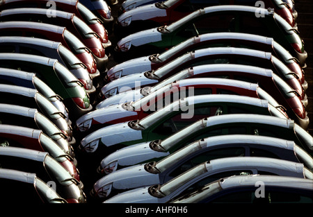 A group of new Ford Ka cars stand in lines as they await shipment from Southampton Docks Hampshire England UK for export Stock Photo