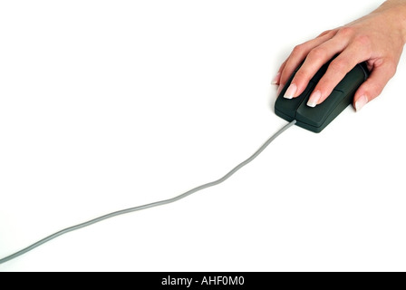 Womans Hand Operating a Computer Mouse Against a White Background Stock Photo