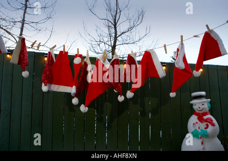 Christmas hats, hanging on clothes line, Iceland Stock Photo
