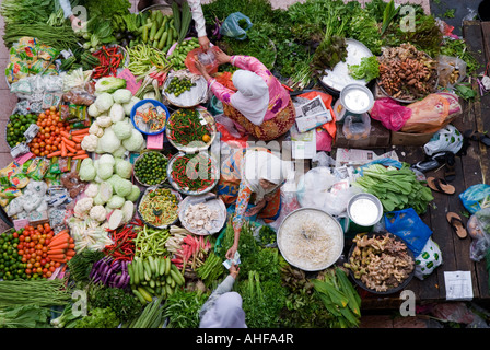 Malaysian Grocery Shoppers in a shopping frenzy at a Vegetable