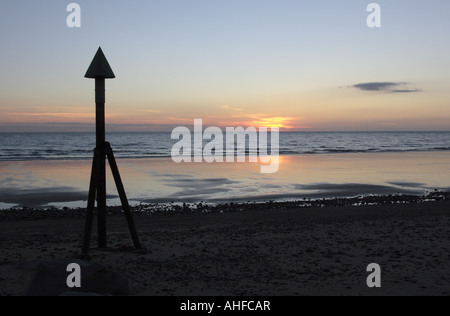 View from Dinas Dinlle beach at sunset Snowdonia Wales Stock Photo