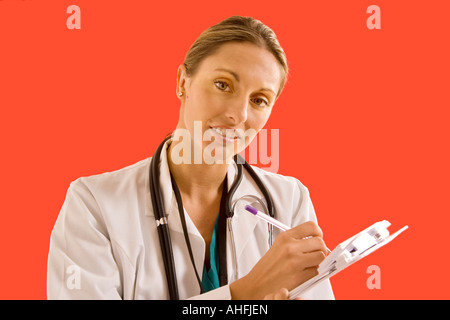 Portrait female physician with chart Stock Photo