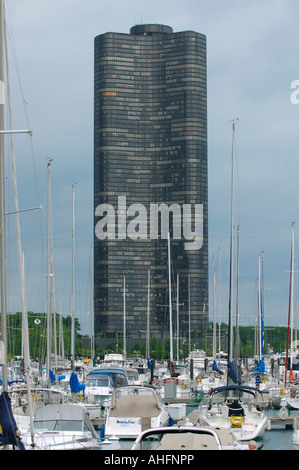 A harbor full of sailboats on Lake Michigan with the Lake Point Tower in the background in Chicago, Illinois, United States Stock Photo