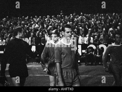 football, Bundesliga, 1968/1969, Boekelberg Stadium, Borussia Moenchengladbach versus Kickers Offenbach 4:1, football players coming to the second half, f.l.t.r. keeper Rudolf Wimmer, Rudolf Koch, Hermann Nuber, Willi Rodekurth (all Offenbach) Stock Photo