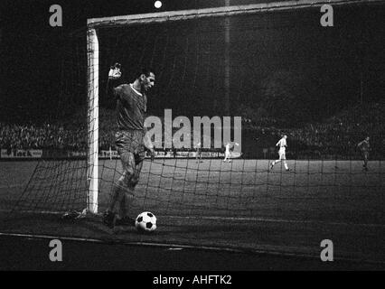 football, Bundesliga, 1968/1969, Boekelberg Stadium, Borussia Moenchengladbach versus Kickers Offenbach 4:1, scene of the match, 4:0 goal to Gladbach by Herbert Laumen (not pictured), Hermann Nuber (Offenbach) fetches the ball out of the net Stock Photo