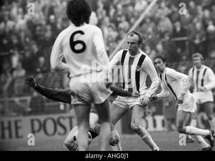 football, Bundesliga, 1973/1974, Boekelberg Stadium, Borussia Moenchengladbach versus MSV Duisburg 3:2, scene of the match, Hans Juergen Wittkamp (MG) fights for the ball, behind him Ulrich Stielike (MG) and Klaus Dieter Sieloff (MG) Stock Photo