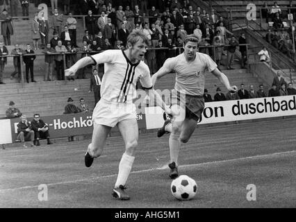 football, Bundesliga, 1968/1969, Boekelberg Stadium, Borussia Moenchengladbach versus Eintracht Brunswick 1:1, scene of the match, duel between Klaus Ackermann (Gladbach) left and Franz Merkhoffer (Braunschweig) Stock Photo