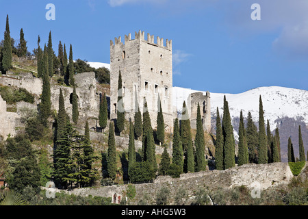 Castle ruin of Arco and in the back the snow covered mountain Mt Baldo, Arco, Lake Garda, Italy Stock Photo