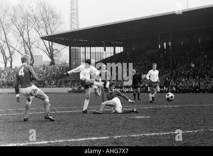 football, Bundesliga, 1969/1970, FC Schalke 04 versus Rot-Weiss Oberhausen 2:2, Glueckaufkampfbahn Stadium in Gelsenkirchen, scene of the match, f.l.t.r. Rolf Ruessmann (Schalke), Hans Fritsche (Oberhausen), Klaus Scheer, Friedel Rausch (both Schalke), re Stock Photo