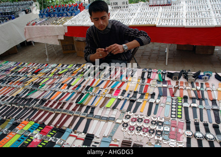 Selling watches in Kalkan market in Southern Turkey. Stock Photo