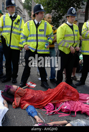 Lie down demonstration Downing Street Whitehall London when 100,000 people protest Israeli attack on Lebanon on August 5 2006. Stock Photo