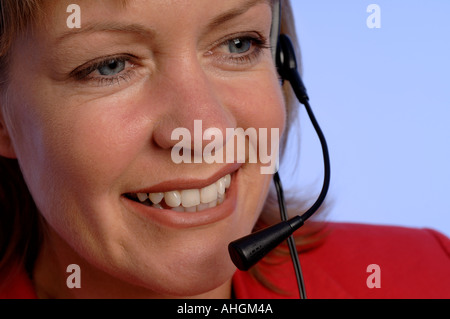 Woman wearing a telephone headset Stock Photo
