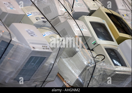 piles of pallet wrapped old discarded computer CRT monitors in ...