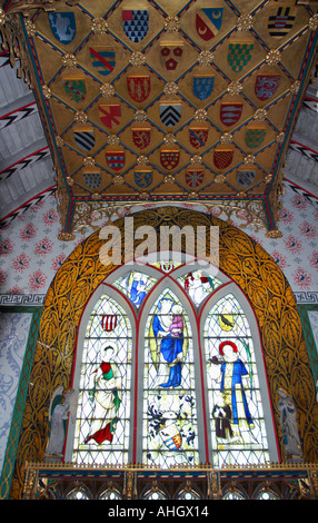 Moreton Corbett Corbet St Bartholomews Church painted interior and stained glass window Shropshire England UK GB Stock Photo