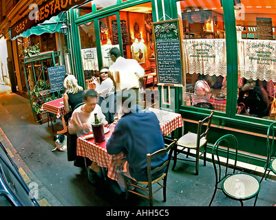 French Restaurant, PARIS France, Budget Regional Restaurant 'GR5' (Savoyard) men Sharing Meals, People Dining Outside Sidewalk Terrace Stock Photo