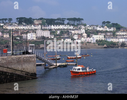 Polruan ferry crossing River Fowey arriving with passengers from the town of Fowey seen on the far bank Stock Photo