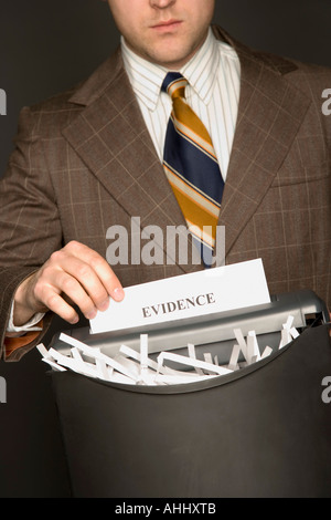 Man shredding the evidence Stock Photo