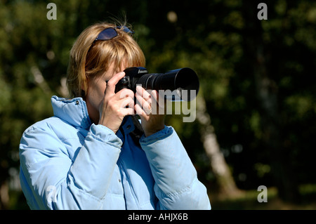 Female photographer Stock Photo