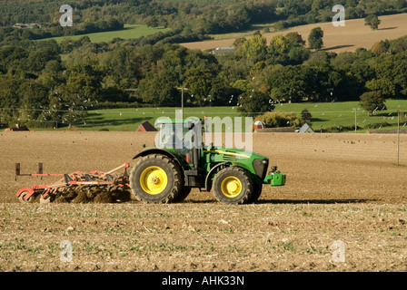 Tractor ploughing a field Stock Photo