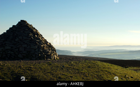 Sunrise over the beacon at the top of Dunkery Hill within the Exmoor National Park Stock Photo