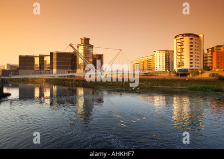 Sunrise on Royal Armouries National Museum and Clarence dock development Leeds Liverpool Canal River Aire Leeds UK Stock Photo