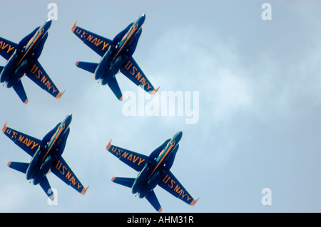 US Navy Blue Angels flight demonstration team flying FA18 Hornet jets in diamond formation Stock Photo