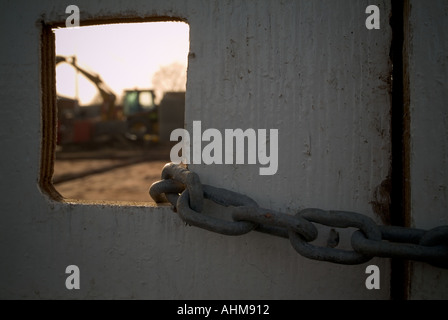 building site construction site danger health and safety keep out lock chain chained locked Stock Photo