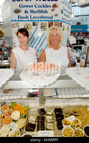 Carol Watts Gower Cockles and Shellfish stall in Swansea Indoor Food Market Wales UK GB EU Stock Photo