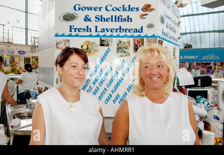 Carol Watts Gower Cockles and Shellfish stall in Swansea Indoor Food Market Wales UK GB EU Stock Photo