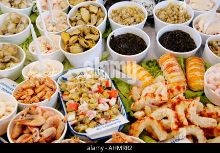 Carol Watts Gower Cockles and Shellfish stall in Swansea Indoor Food Market Wales UK GB EU Stock Photo