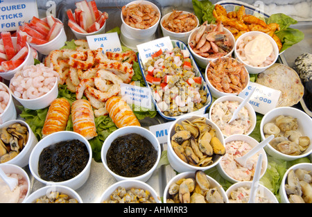 Carol Watts Gower Cockles and Shellfish stall in Swansea Indoor Food Market Wales UK GB EU Stock Photo