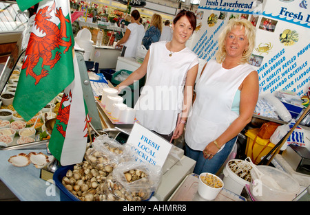 Carol Watts Gower Cockles and Shellfish stall in Swansea Indoor Food Market South Wales UK Stock Photo